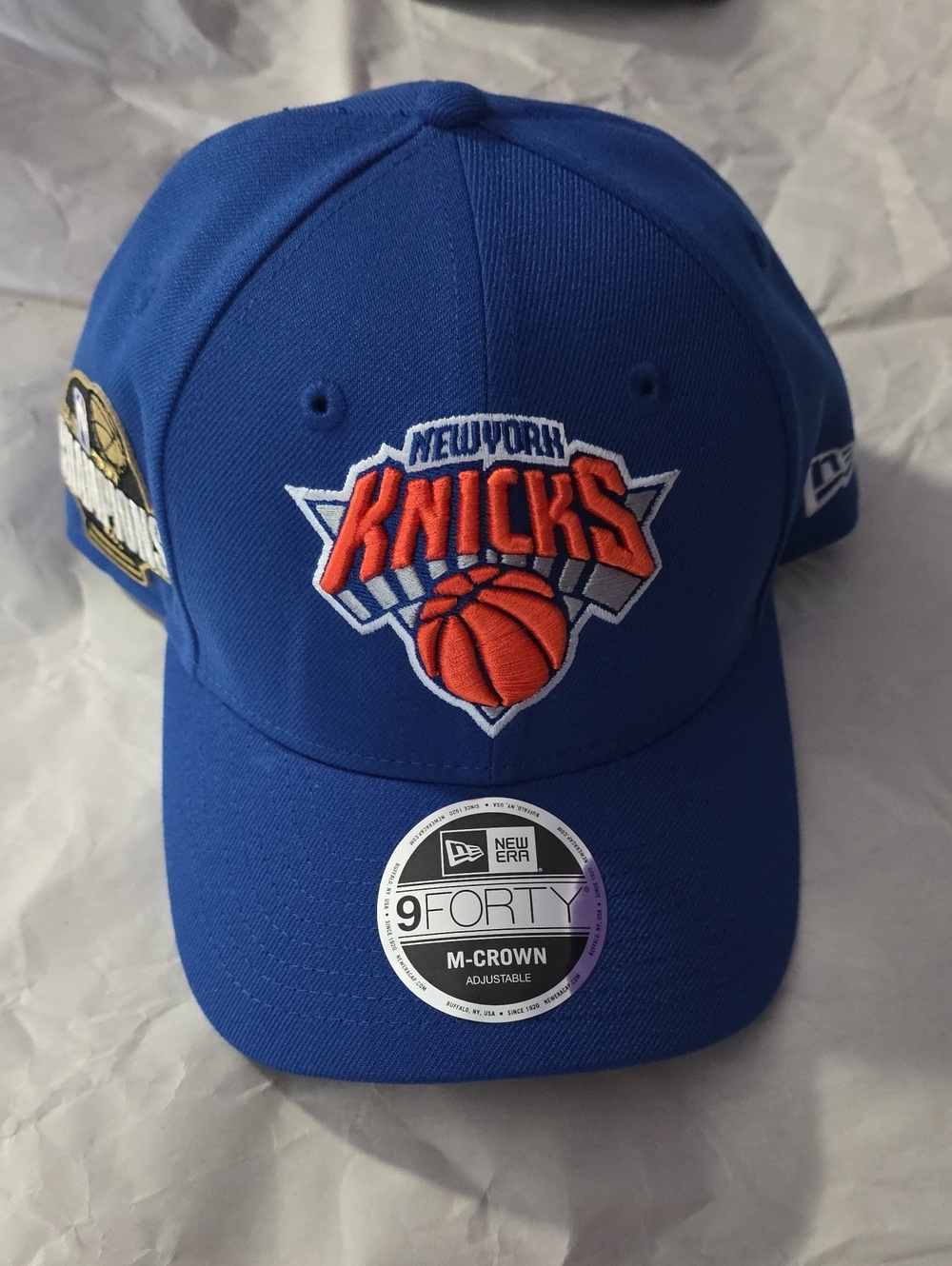 New Era New York Knicks Blue 9FORTY Adjustable Hat With Champions Side Patch.